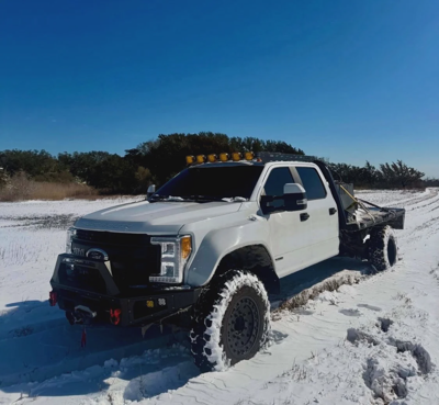 Ford F450 White Flatbed Snowy Field