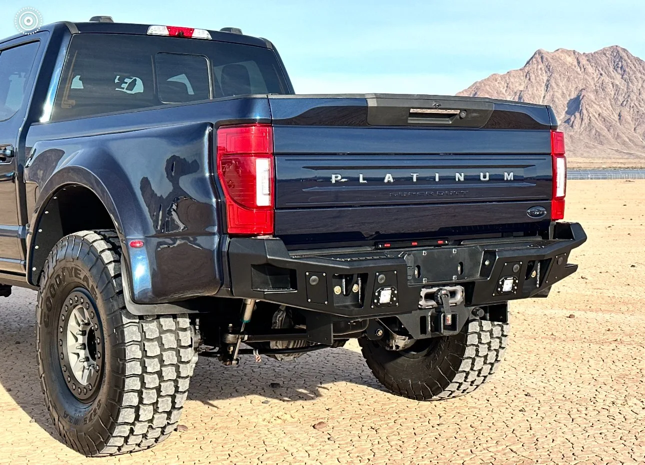 F-450 with a rear winch hitch, severe duty rear bumper and super single wheels