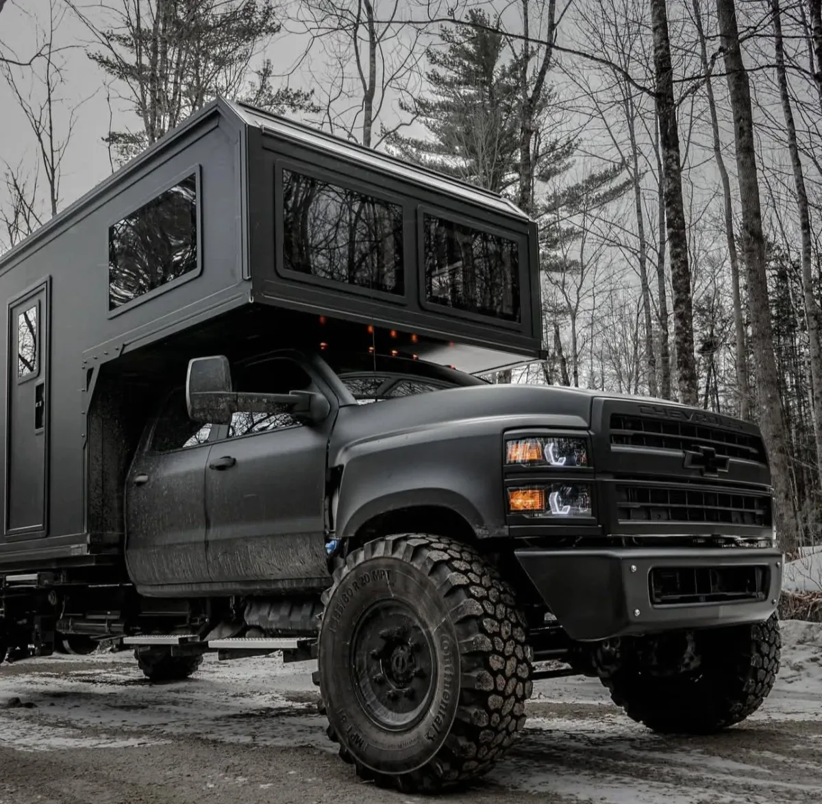 Chevrolet 5500 expedition camper with DBL Design fenders on super singles