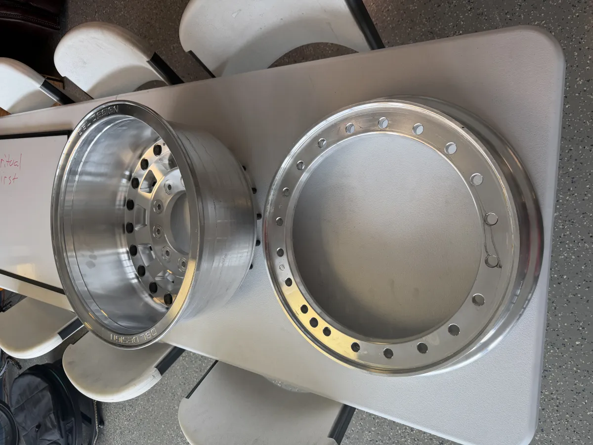 Two-piece forged aluminum wheel separated to show the internal beadlock